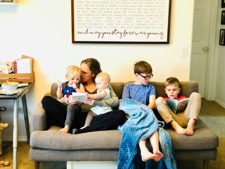 Family enjoying time together on a living room couch